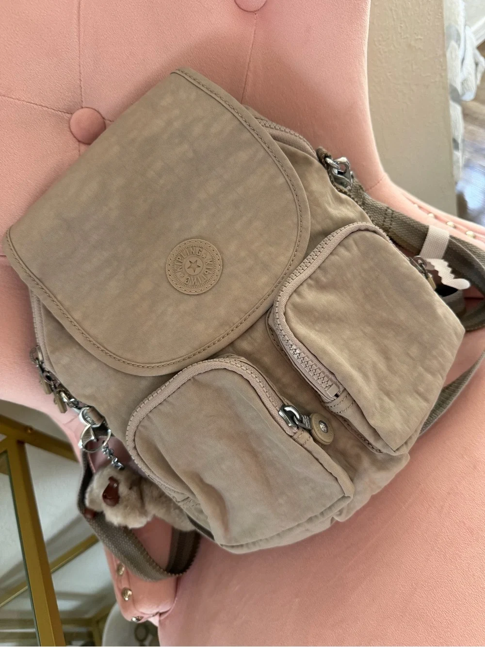 The Kipling Firefly Up Convertible Backpack